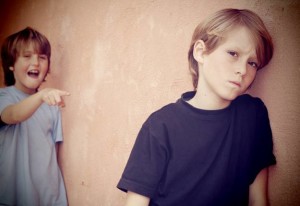 School bully, child being bullied in playground