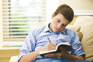 LDS Young Man Studying the Scriptures
